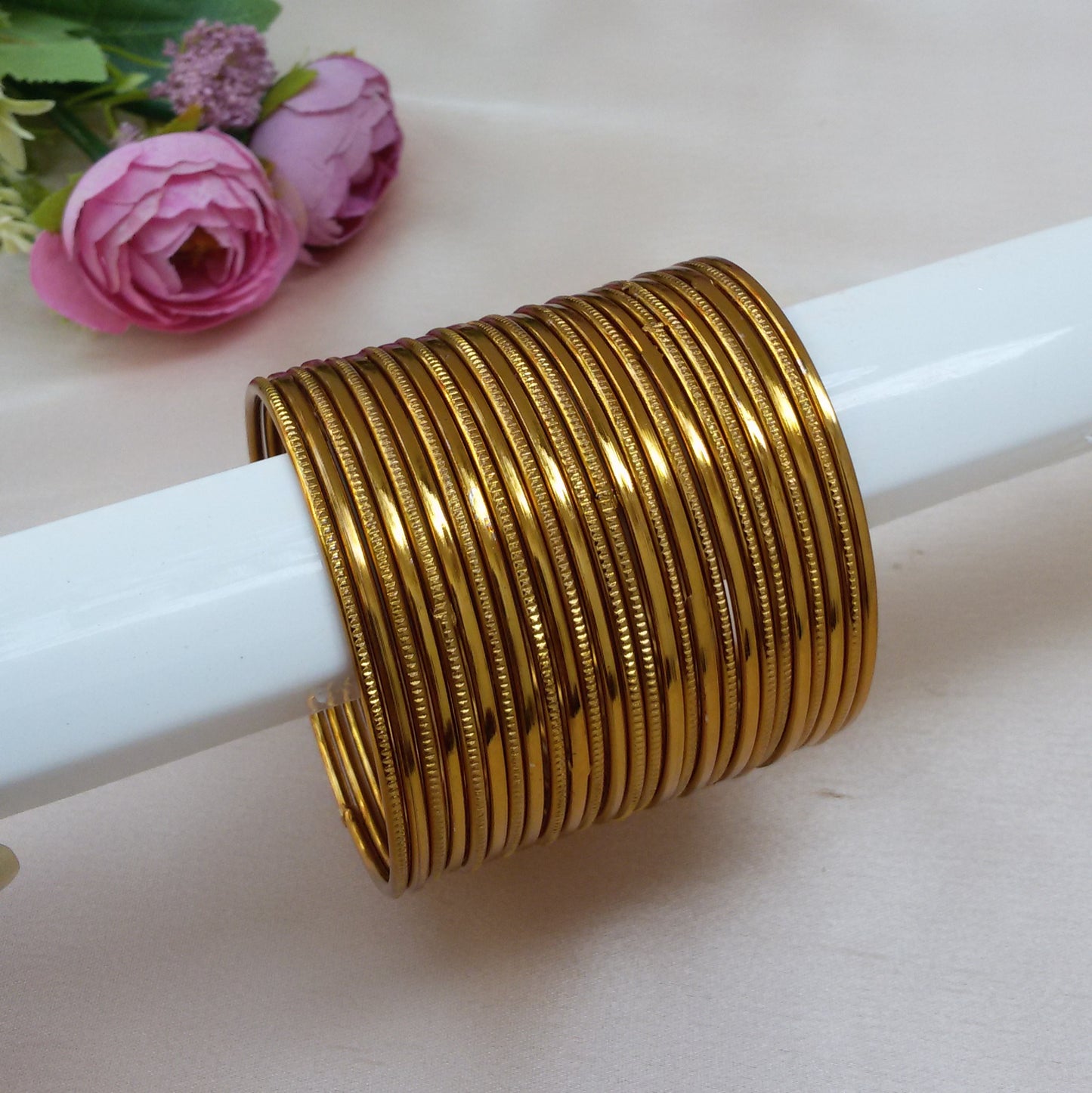 Gold metal bangle set