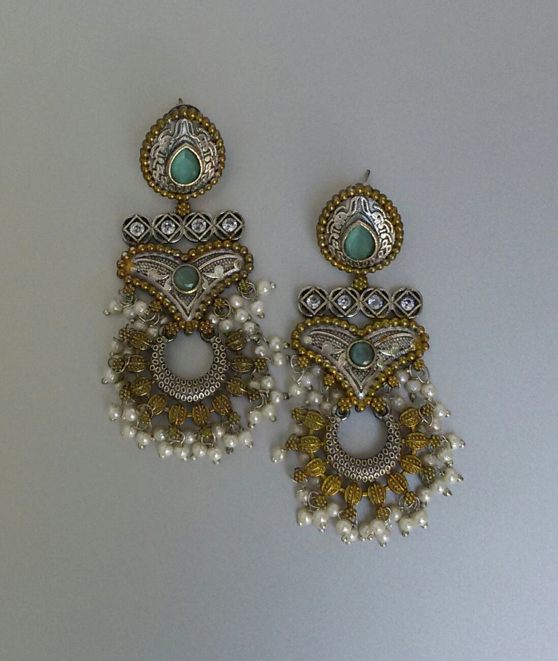Atharvi dual tone long Earrings