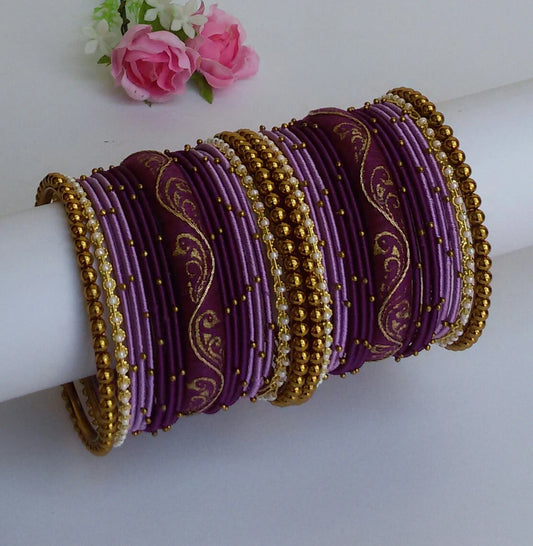 Light lavender and purple bangle set (2.6)