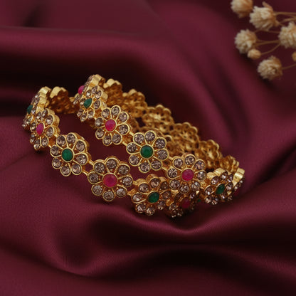 Gold plated floral stone studded bangles