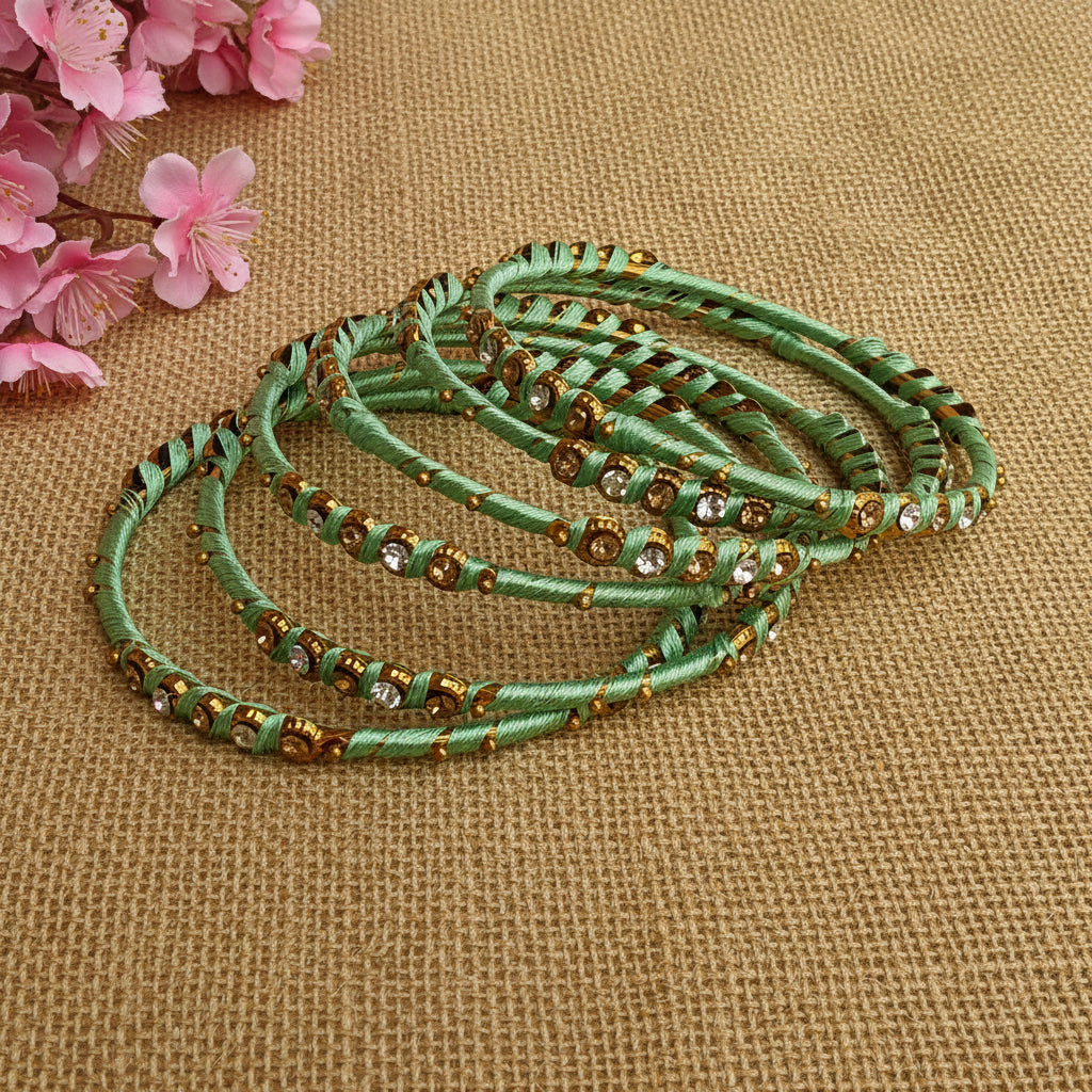 Light teal green bangles