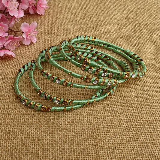 Light teal green bangles