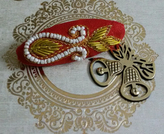Red zardosi work saree pin