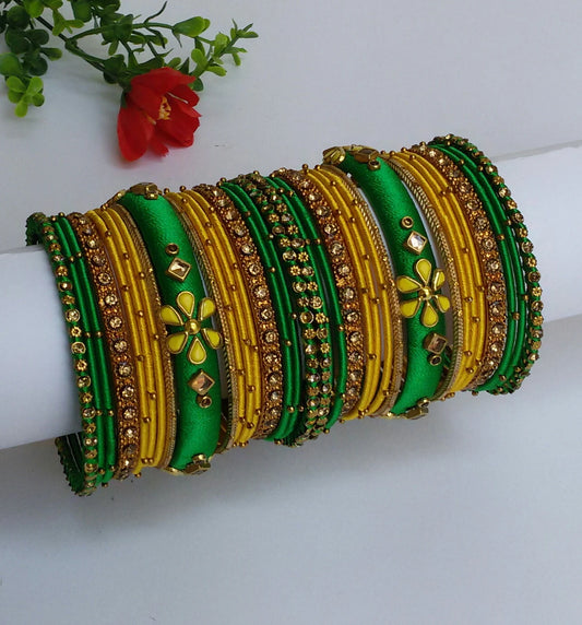 Green and yellow handcrafted bangles set with kundans (2.6)